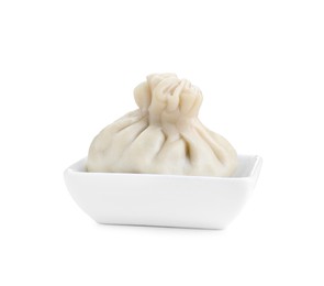 Photo of One tasty khinkali (dumpling) in bowl isolated on white. Georgian cuisine