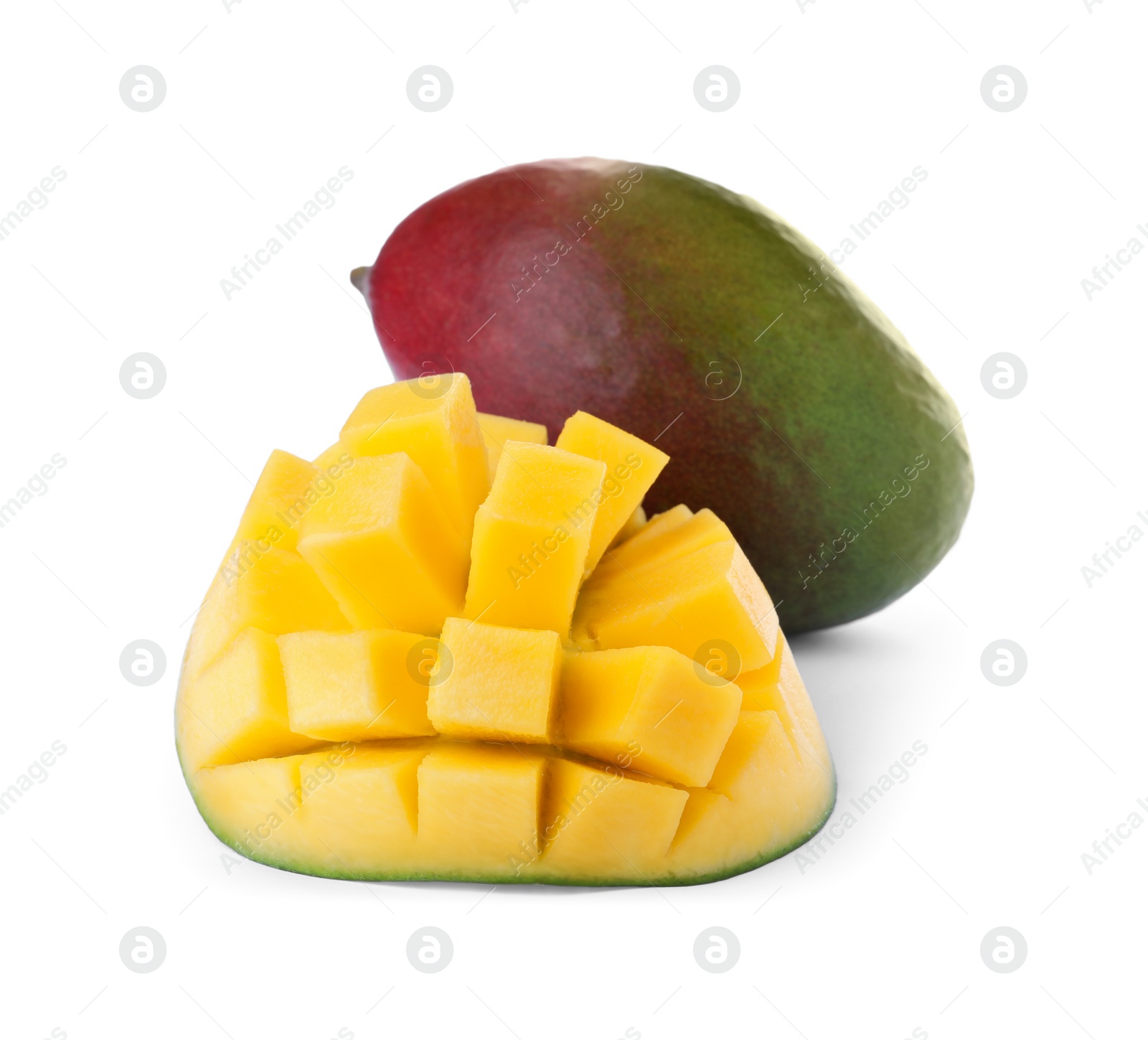 Photo of Cut and whole ripe mangoes isolated on white