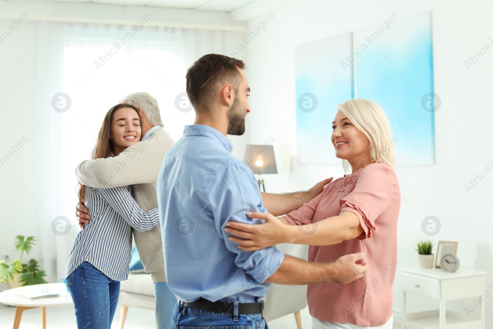 Photo of Happy family at home. Reunion of generations