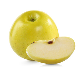 Image of Cut and whole yellow apples on white background