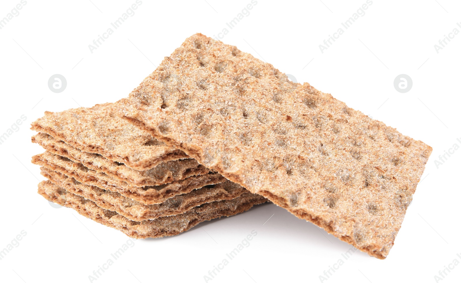 Photo of Many fresh crunchy crispbreads on white background. Healthy snack