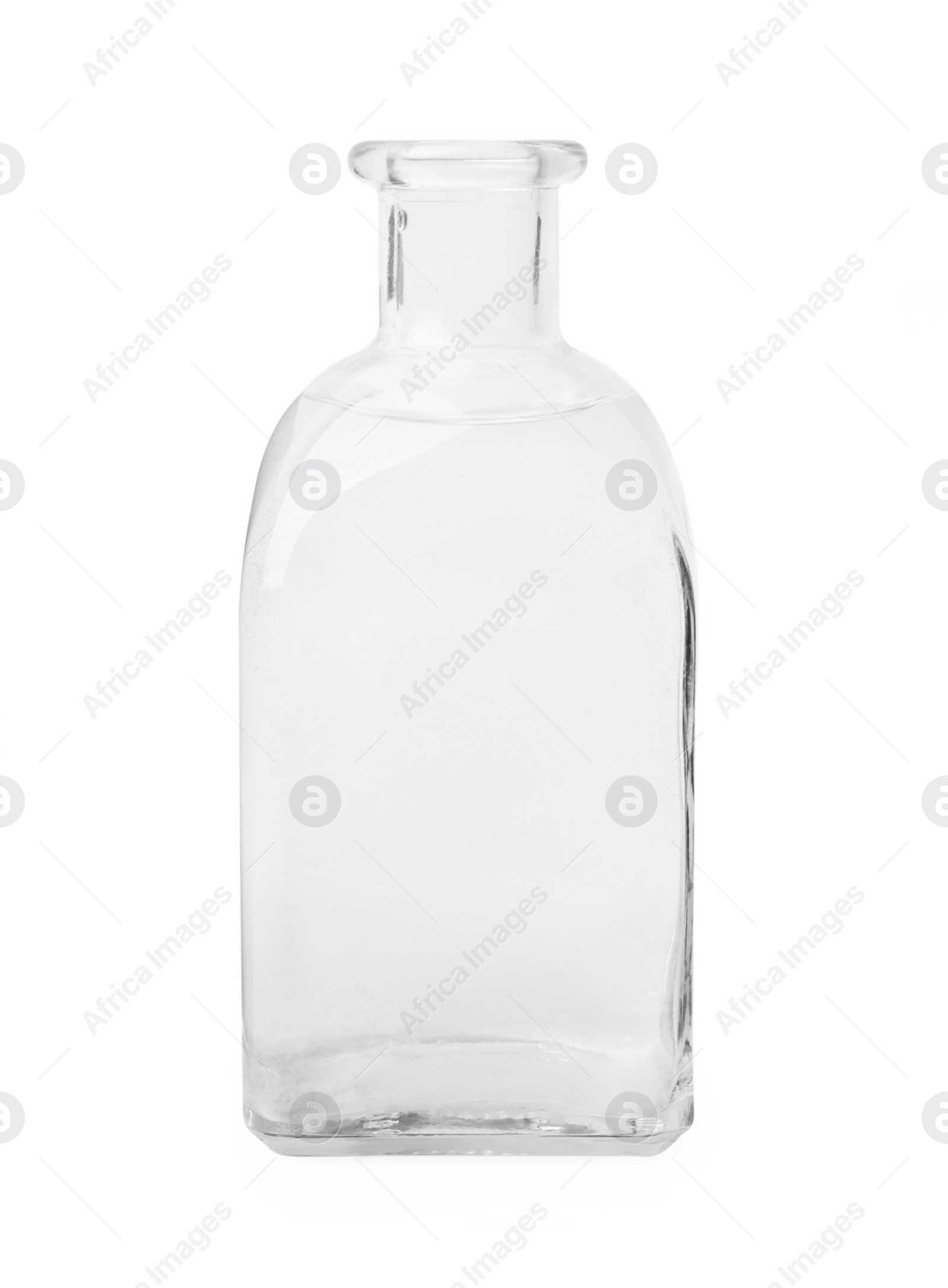 Photo of Vinegar in glass bottle isolated on white