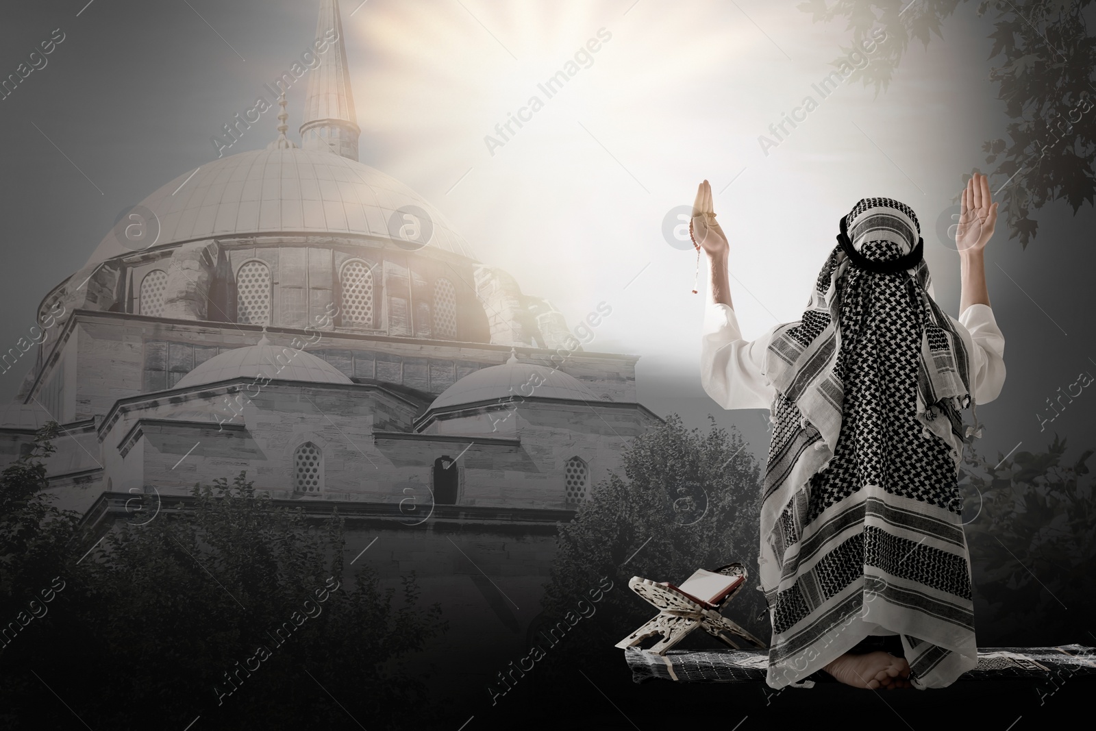 Image of Muslim man praying and mosque on background