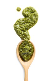 Photo of Sample of tasty pesto sauce and spoon isolated on white, top view