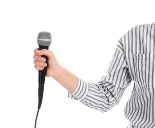 Young woman holding microphone on white background, closeup