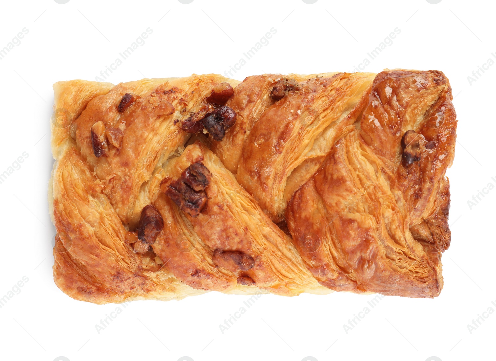 Photo of Tasty sweet bun with raisins isolated on white, top view. Fresh pastry