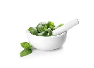 Mortar with fresh green basil leaves on white background