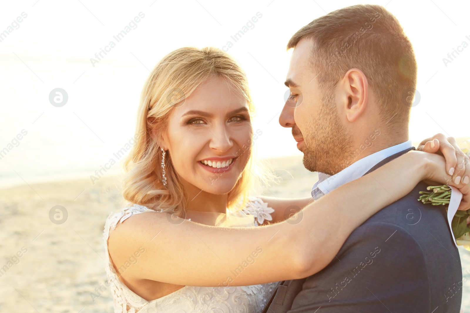 Photo of Wedding couple. Bride and groom on beach