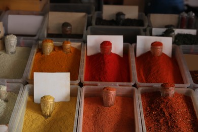 Assortment of different aromatic spices in containers