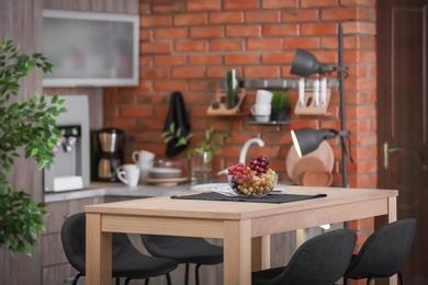 Photo of Stylish kitchen interior in apartment. Idea for home design