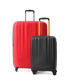 Photo of Modern suitcases for travelling on white background