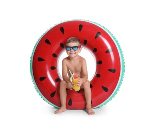 Photo of Cute little boy with inflatable ring and glass of cocktail on white background