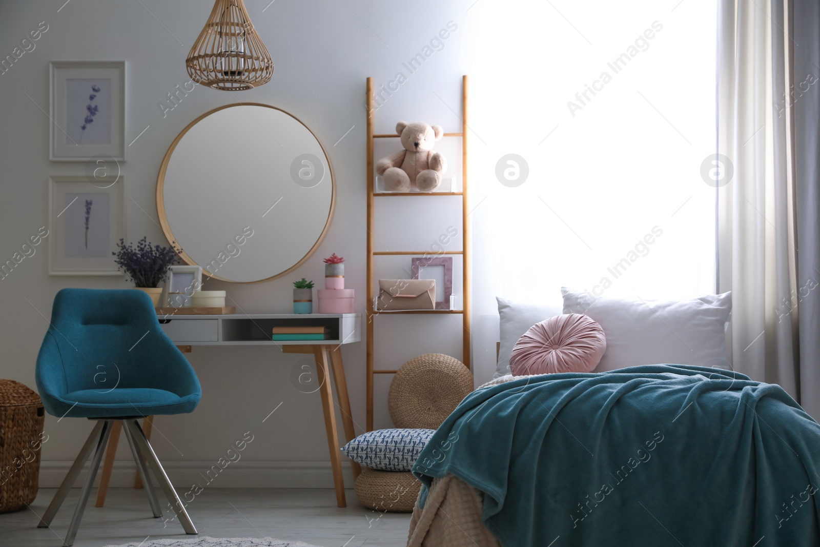 Photo of Teenage girl's bedroom interior with stylish furniture. Idea for design