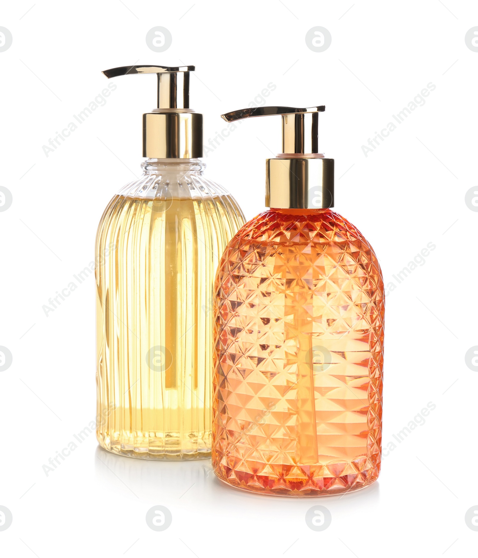 Photo of Stylish dispensers with liquid soap on white background