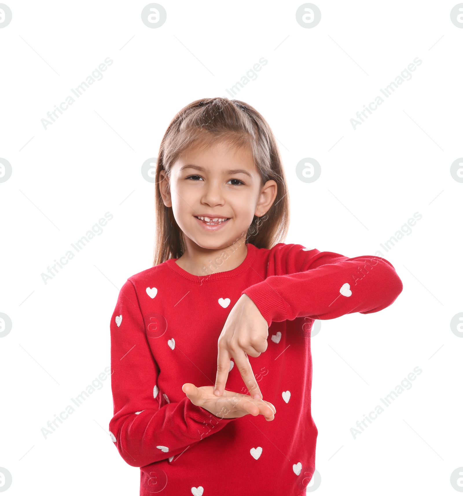Photo of Little girl showing STAND gesture in sign language on white background