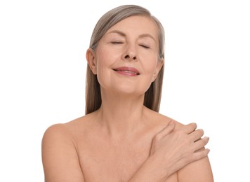 Mature woman with healthy skin on white background