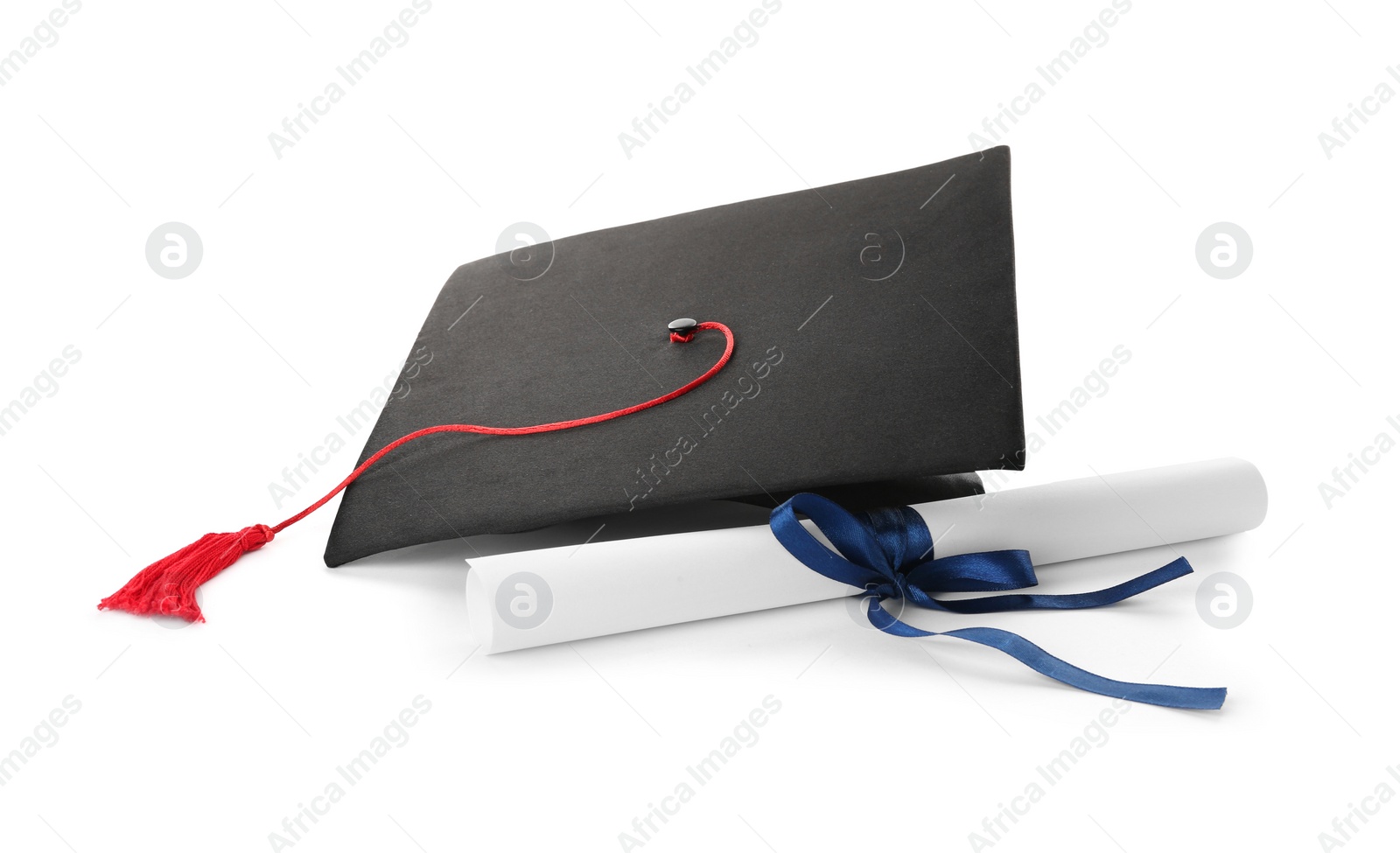 Photo of Graduation hat and diploma on white background