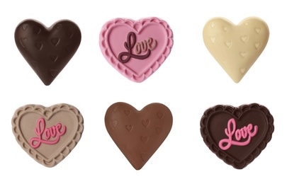 Image of Set with heart shaped chocolate candies on white background