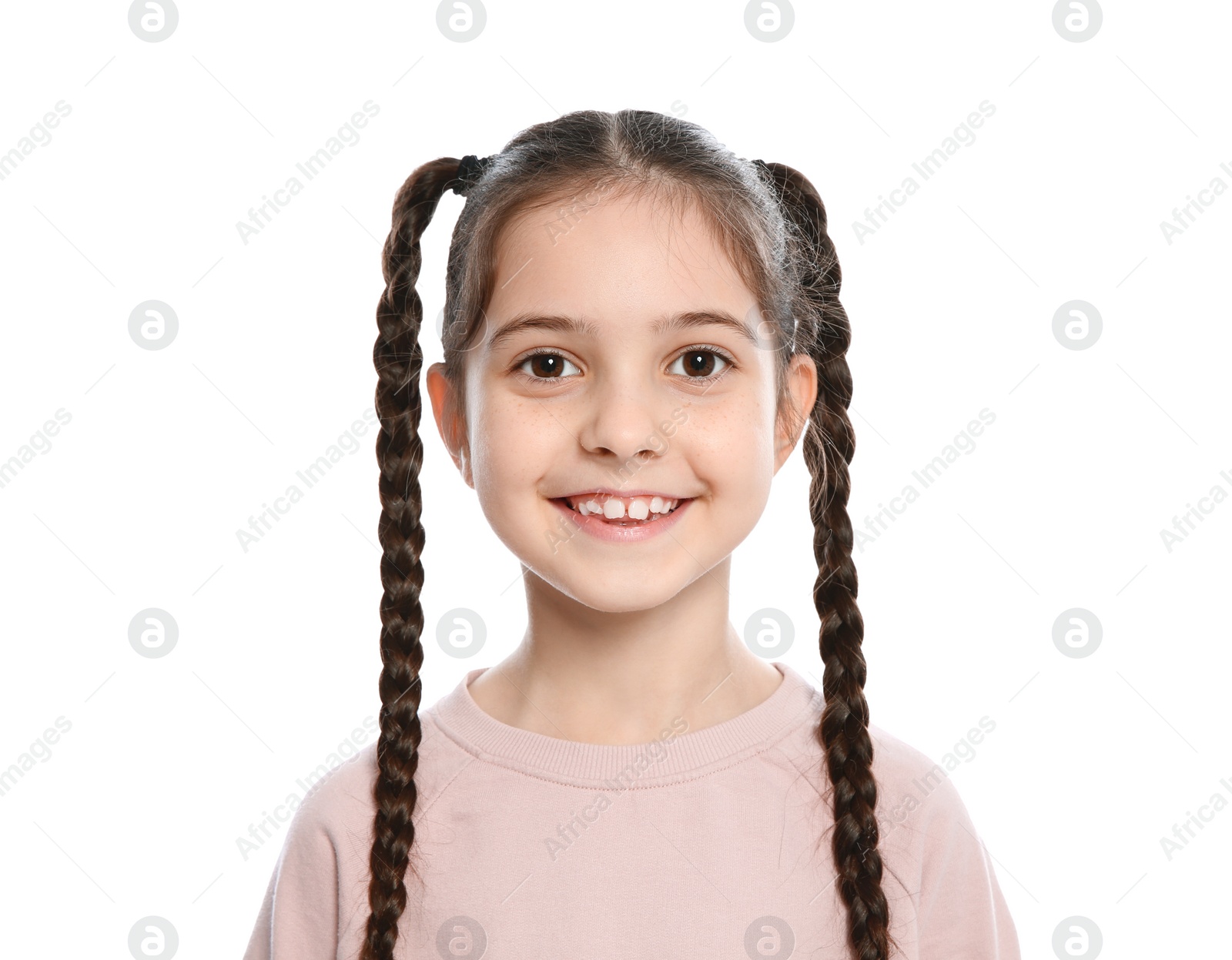 Photo of Portrait of little girl laughing on white background