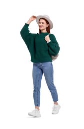 Photo of Happy woman in hat with backpack on white background