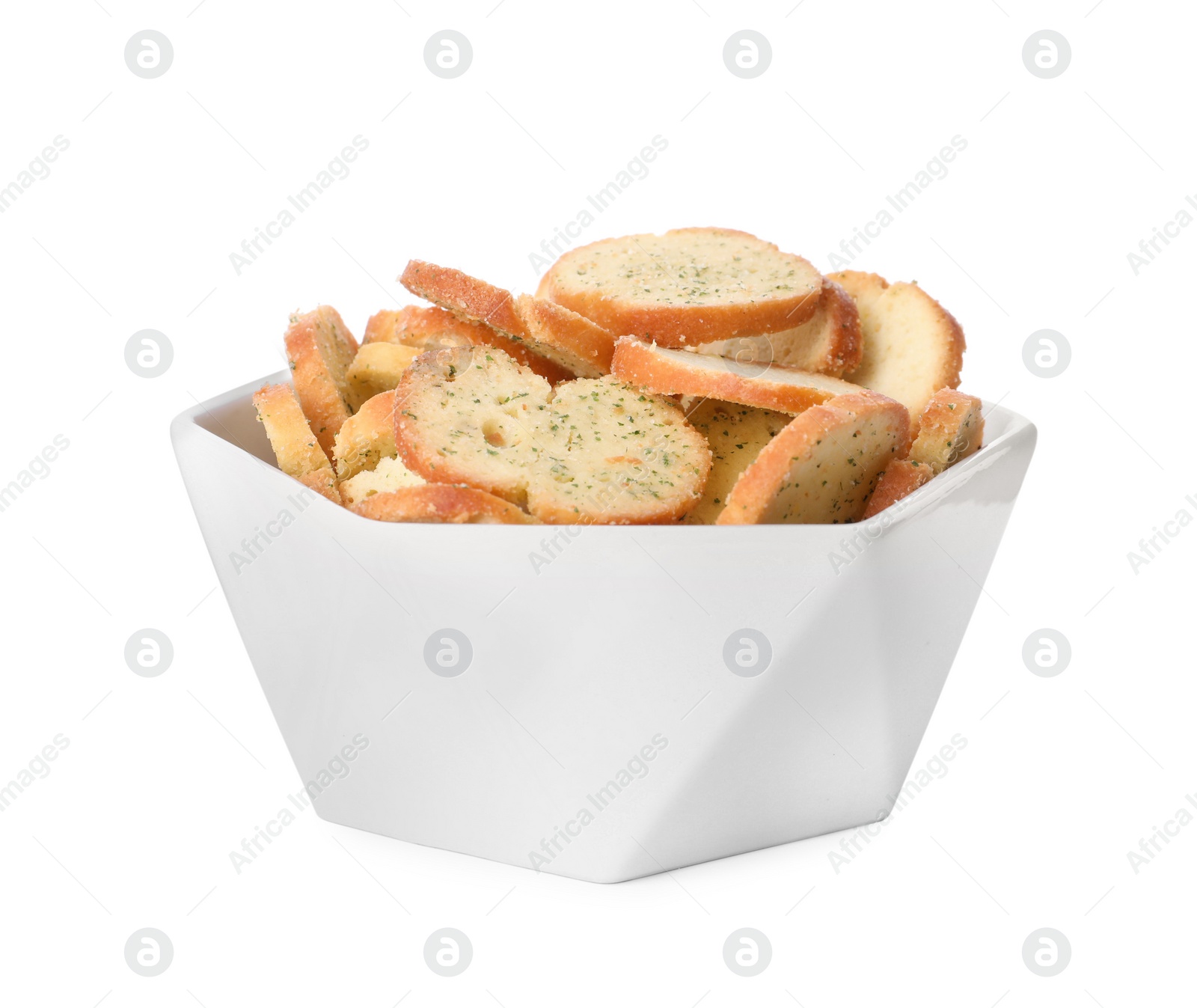 Photo of Crispy rusks with seasoning in bowl isolated on white