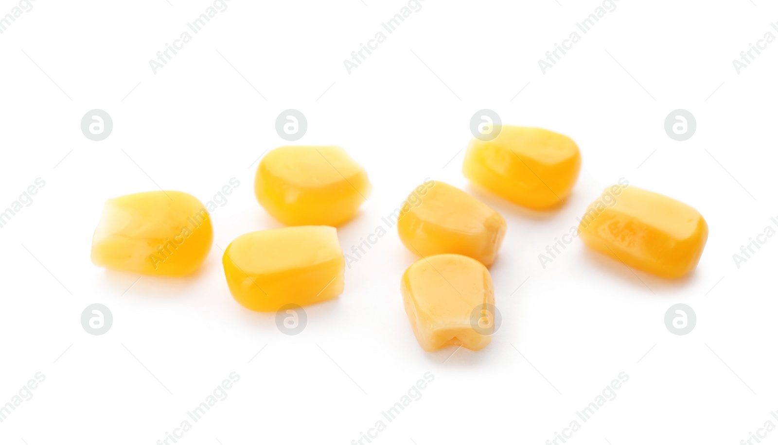 Photo of Tasty ripe corn kernels on white background