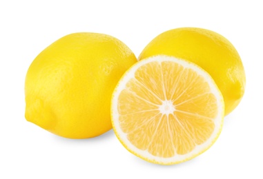Photo of Sliced and whole fresh lemons on white background