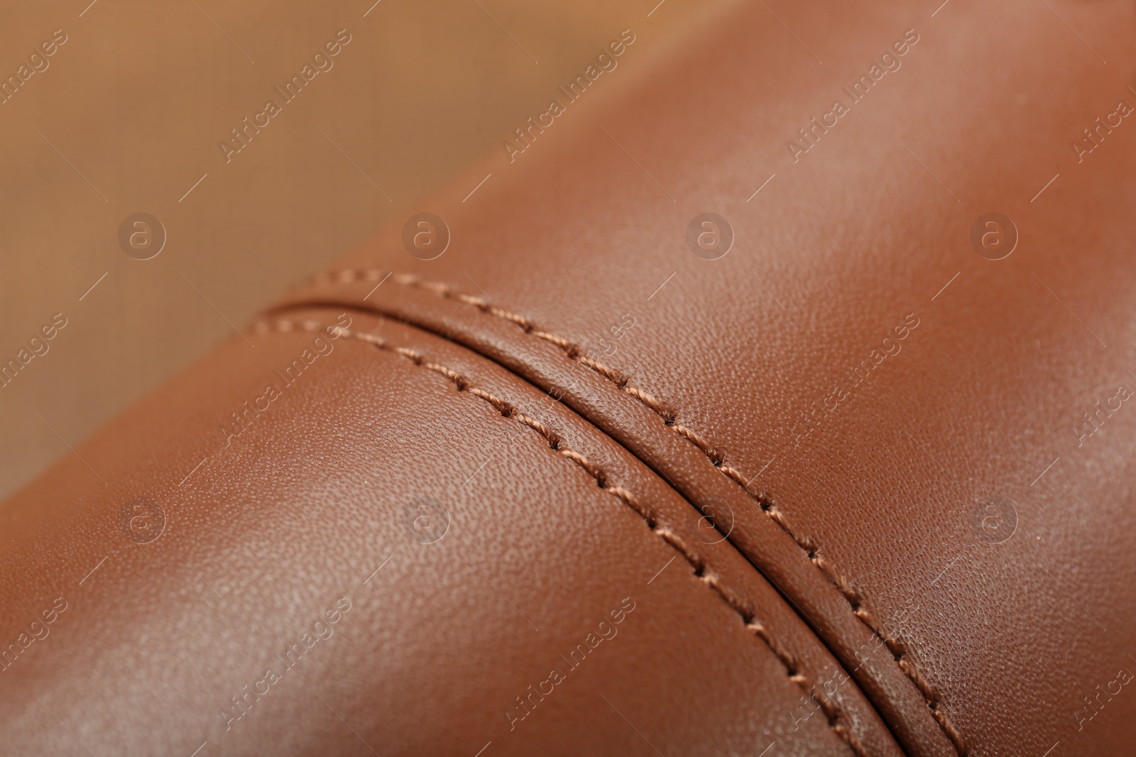 Photo of Texture of brown leather as background, closeup