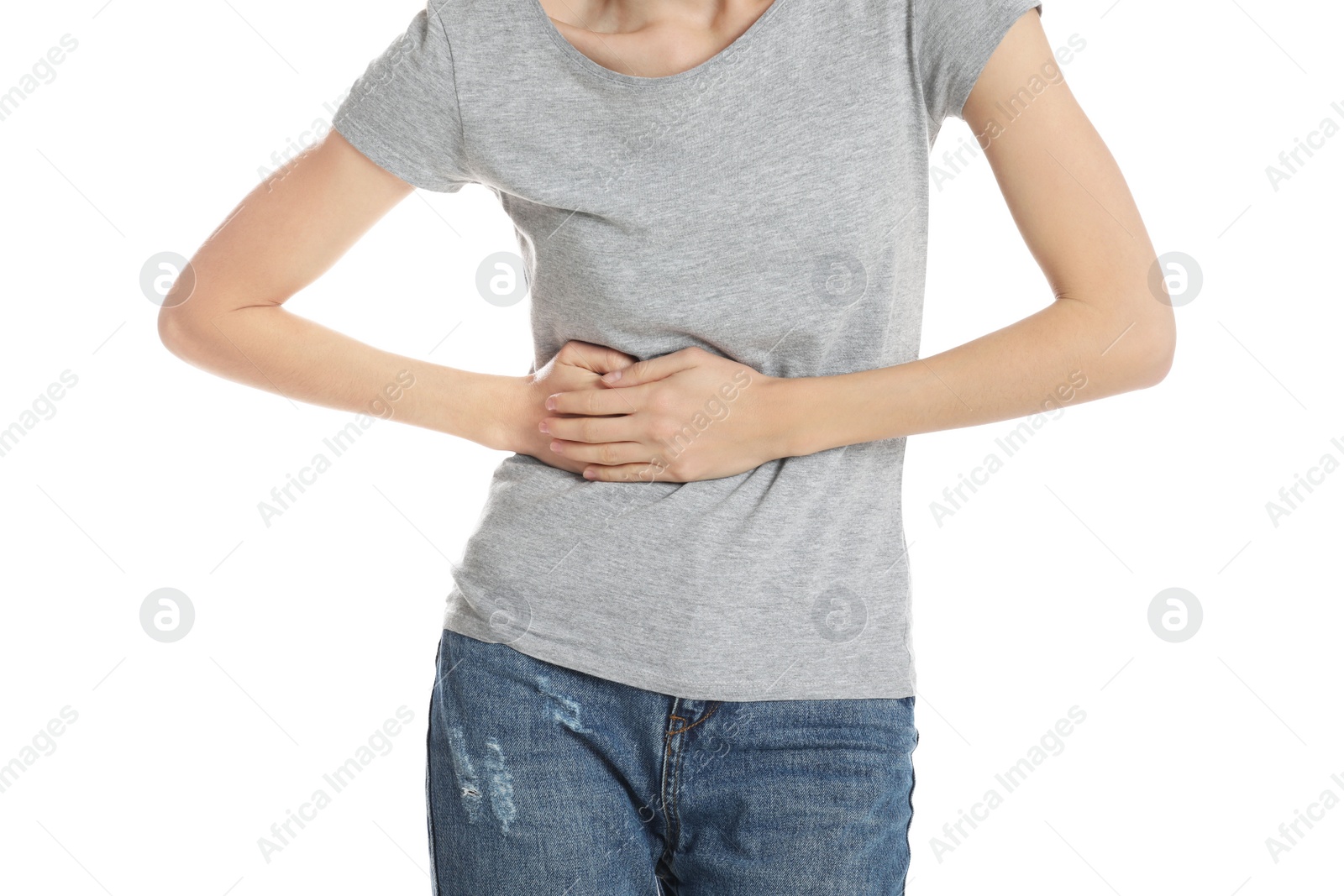 Photo of Young woman suffering from liver pain on white background, closeup