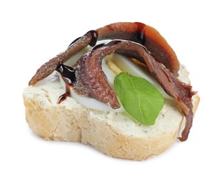 Photo of Delicious bruschetta with anchovies, eggs, basil and sauce on white background