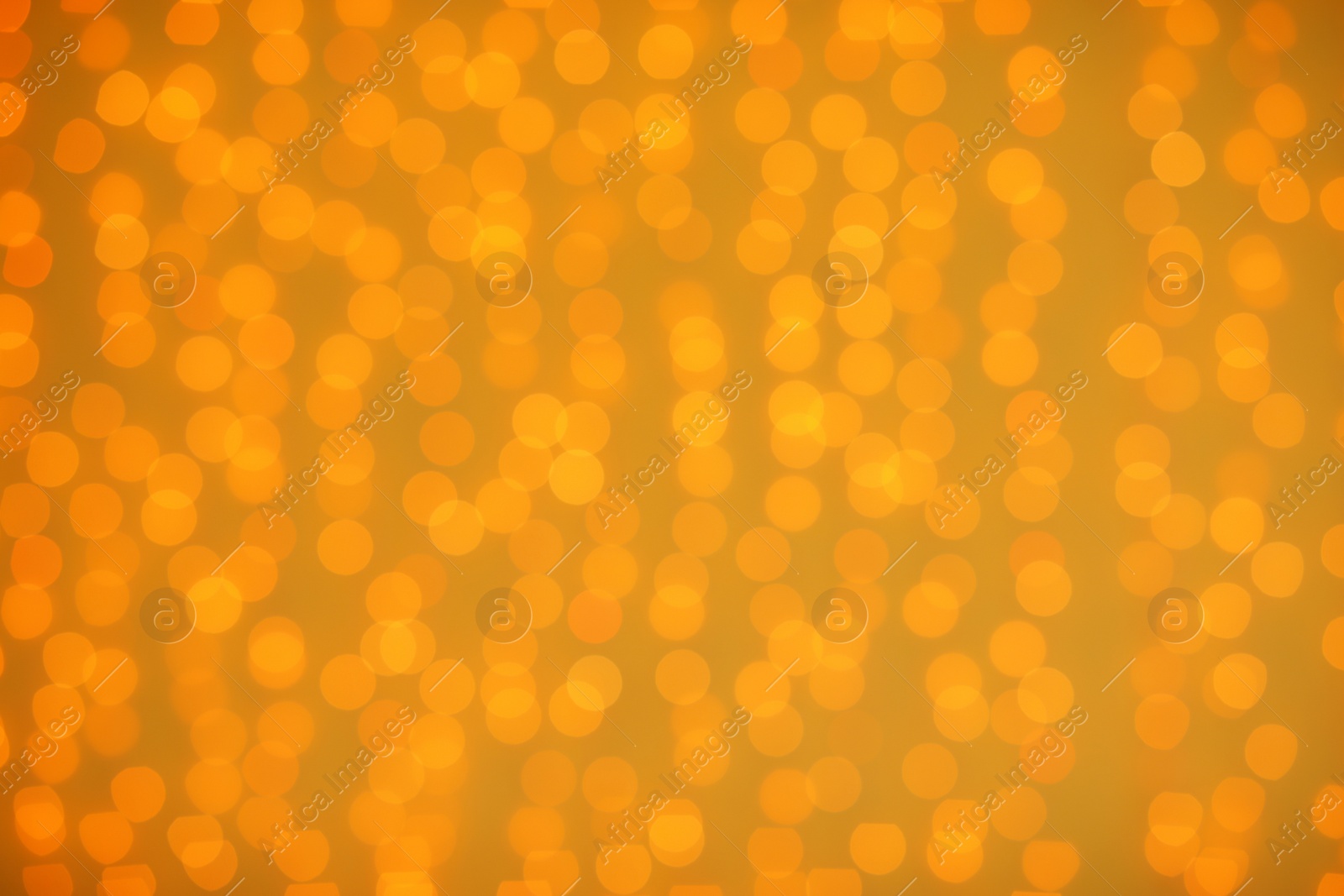 Photo of Beautiful gold lights as background. Bokeh effect