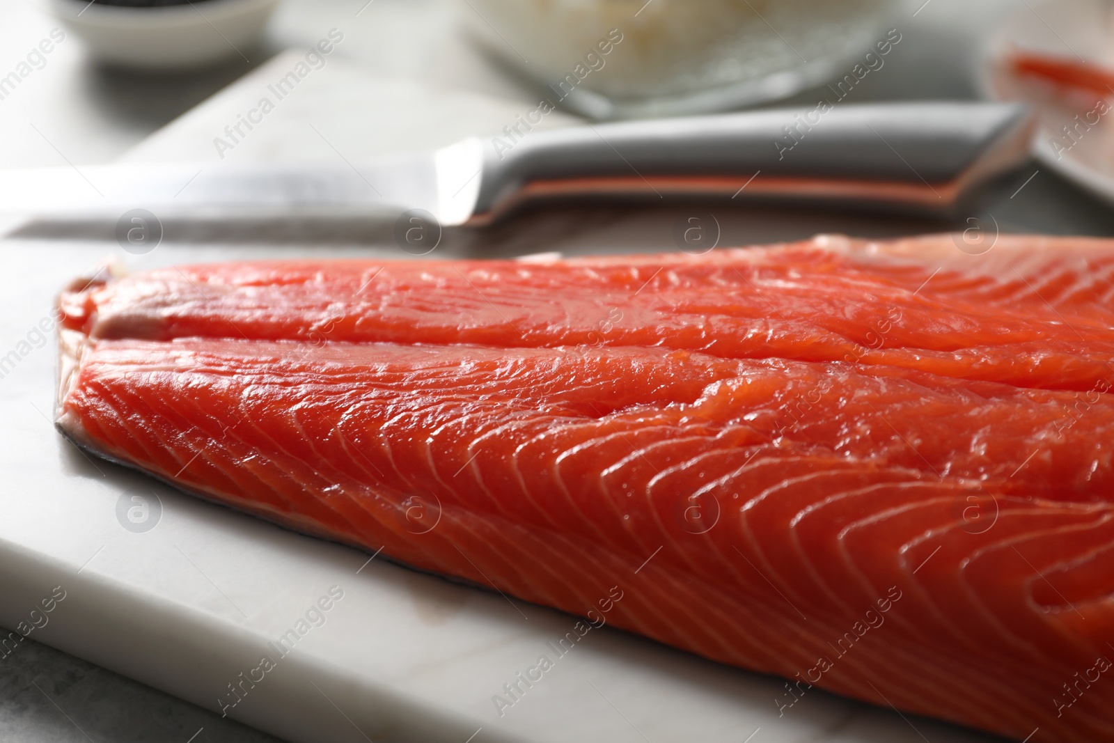 Photo of Fresh salmon for sushi on table, closeup