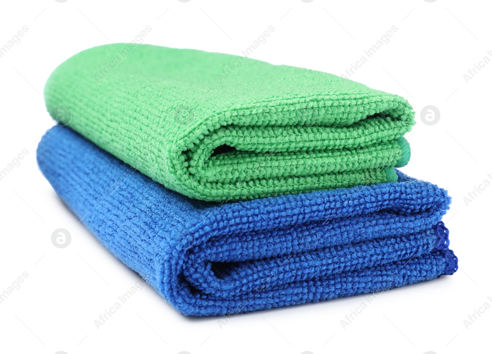 Photo of Green and blue microfiber cloths on white background