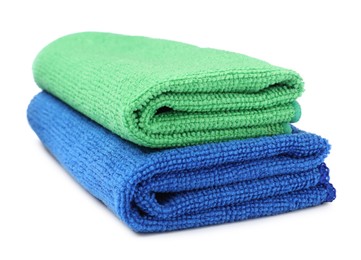 Photo of Green and blue microfiber cloths on white background