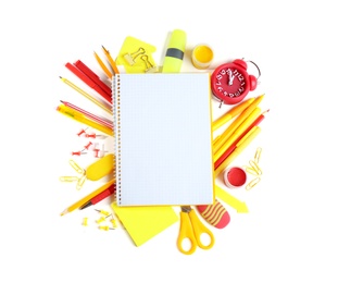 Composition with different school stationery and open blank notebook on white background, top view