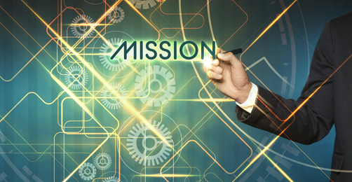 Image of Mission concept. Businessman using virtual screen, closeup