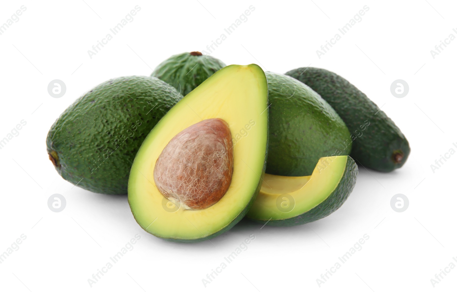 Photo of Ripe avocados on white background. Tropical fruit