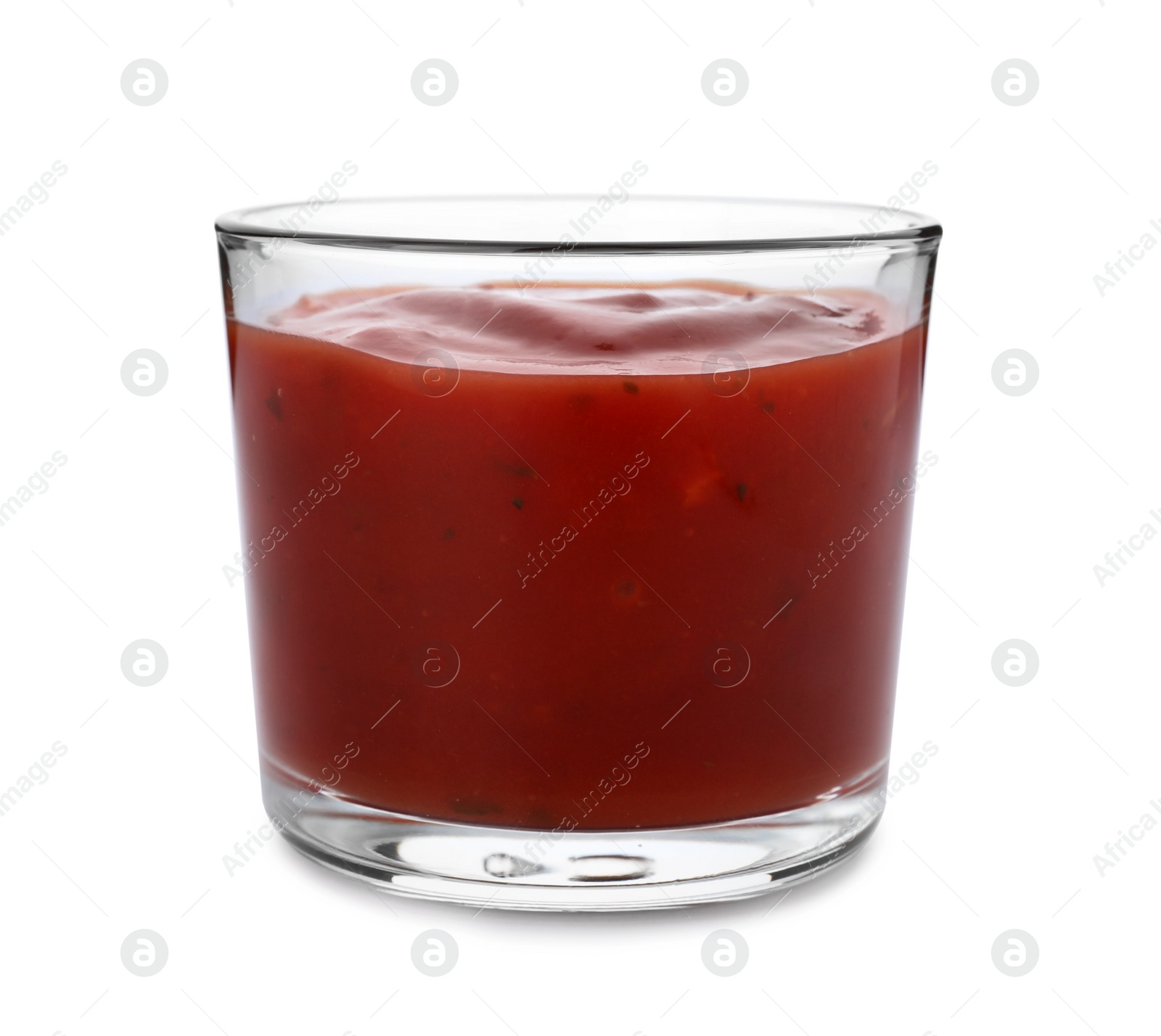 Photo of Glass of spicy chili sauce on white background