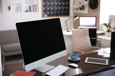 Photo of Stylish workplace with computer on table