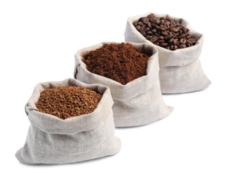 Photo of Bags with different types of coffee on white background