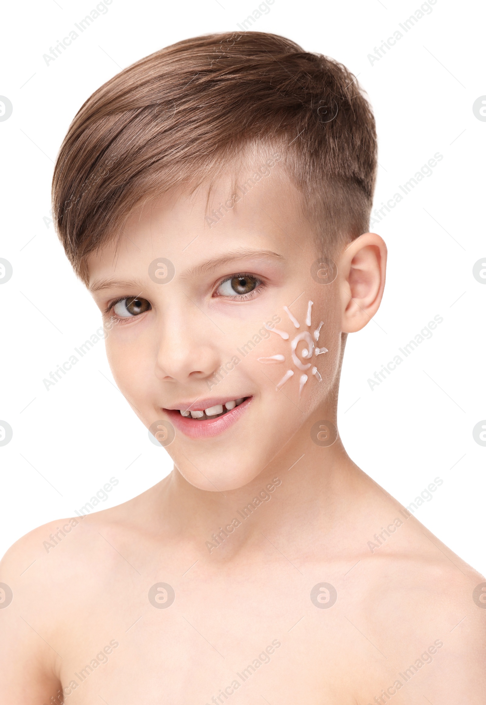 Photo of Happy boy with sun protection cream on his face against white background