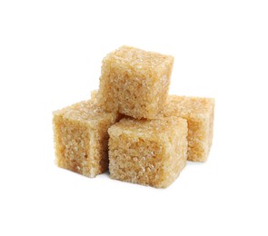 Photo of Many brown sugar cubes isolated on white