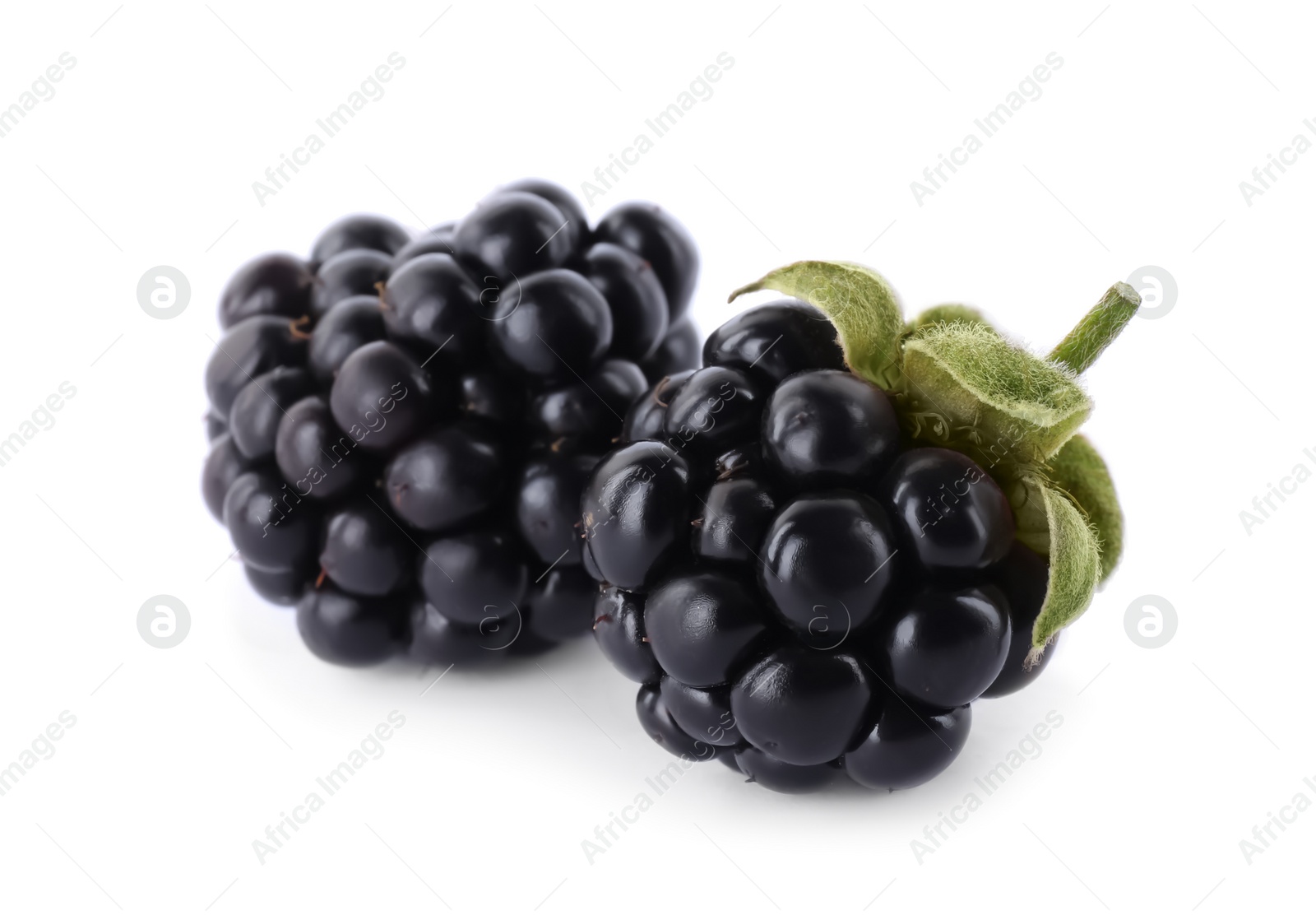 Photo of Delicious fresh ripe blackberries isolated on white