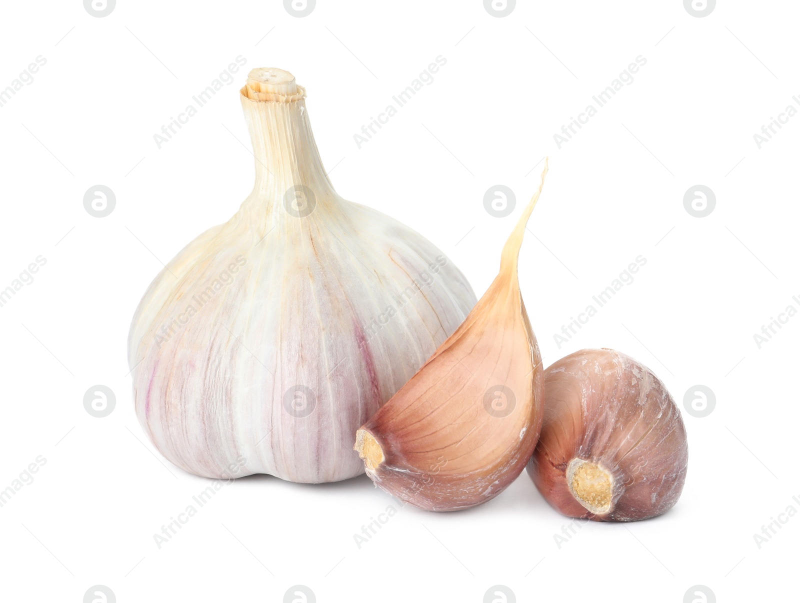 Photo of Fresh organic garlic bulb and cloves on white background