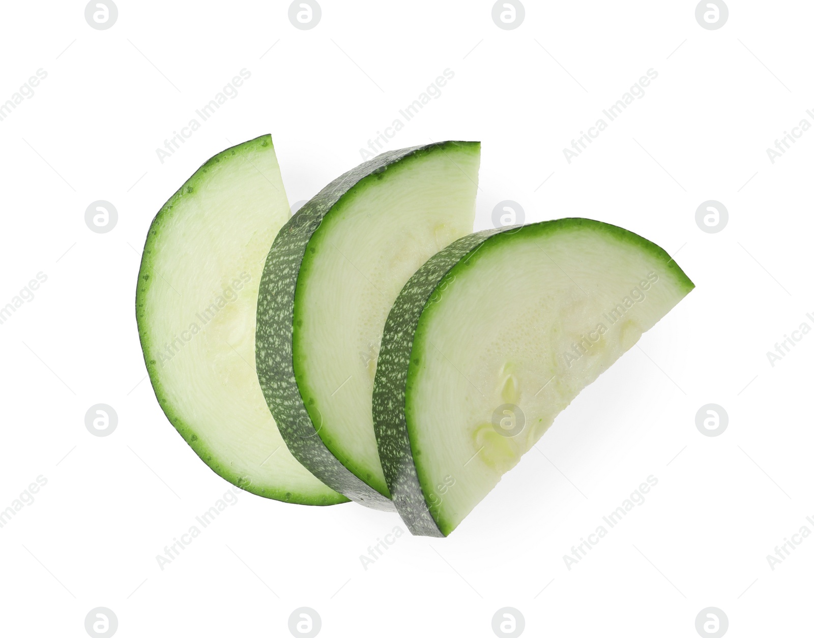 Photo of Slices of ripe zucchini on white background, top view