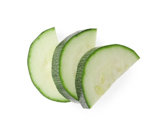 Photo of Slices of ripe zucchini on white background, top view