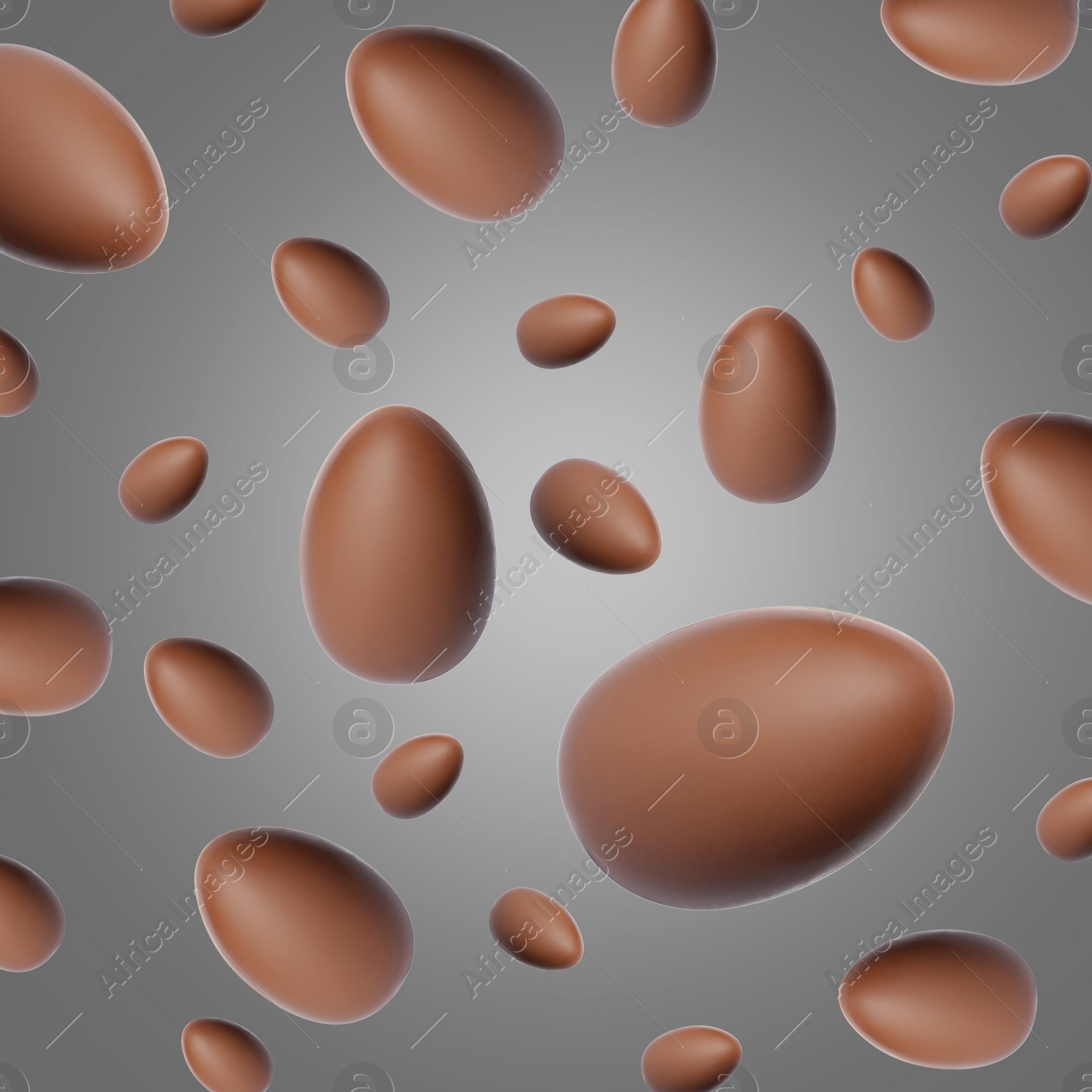 Image of Many chocolate eggs falling on grey background