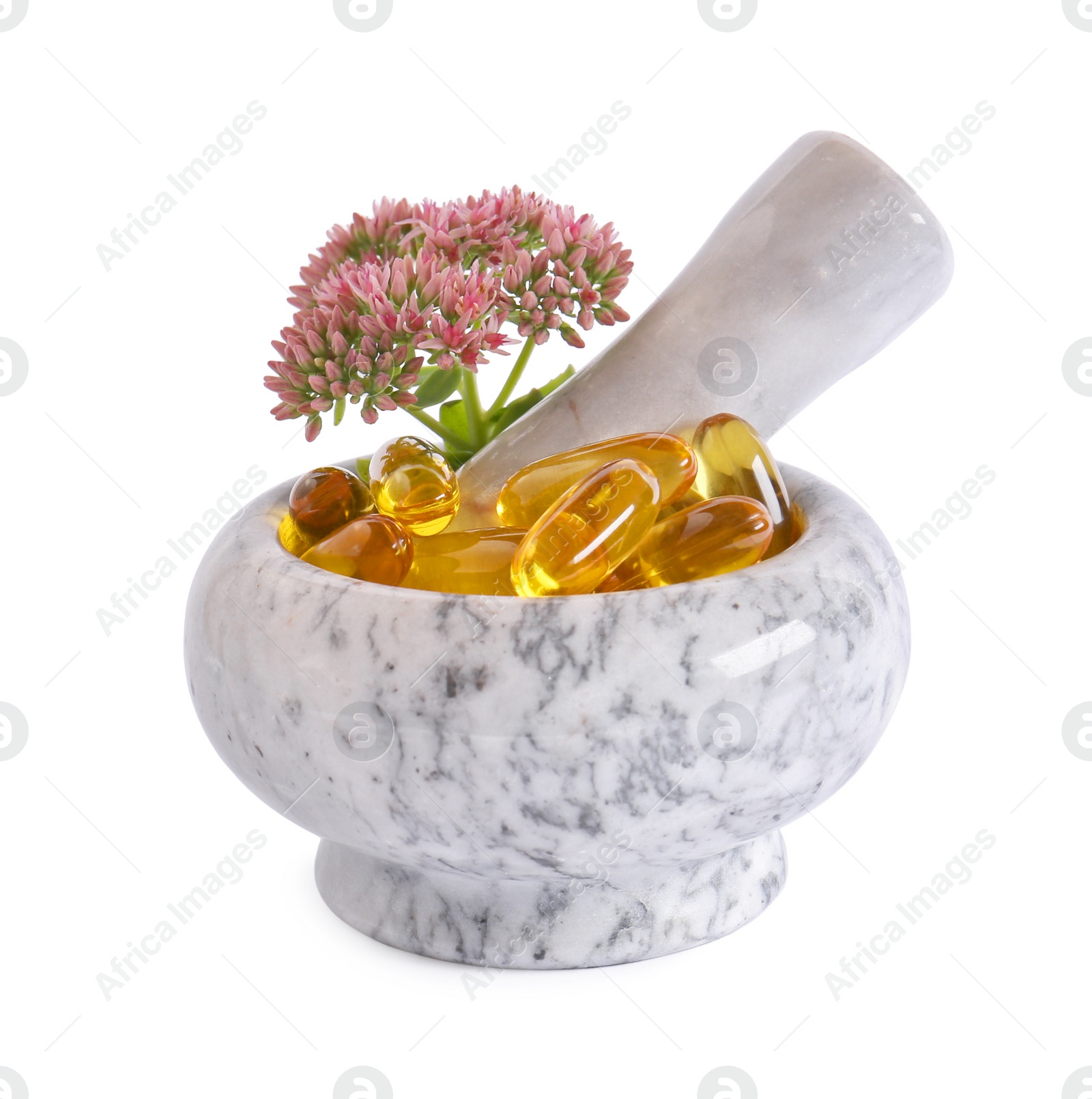Photo of Mortar with flowers and pills on white background