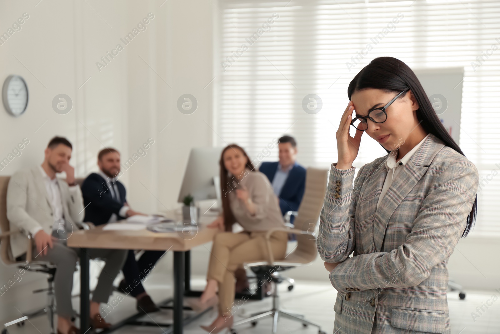 Photo of Woman suffering from toxic environment at work