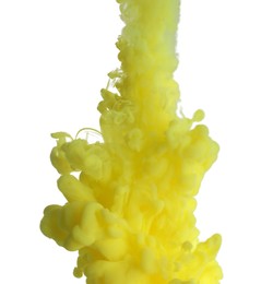 Photo of Splash of yellow ink on light background, closeup